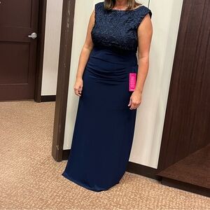 Women’s dress size 14 .  New with tags purchased from Dillards